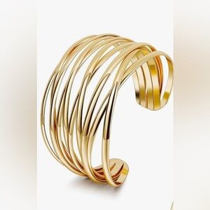 Gorgeous upscale Neiman Marcus 14KT dip Huge open work bracelet